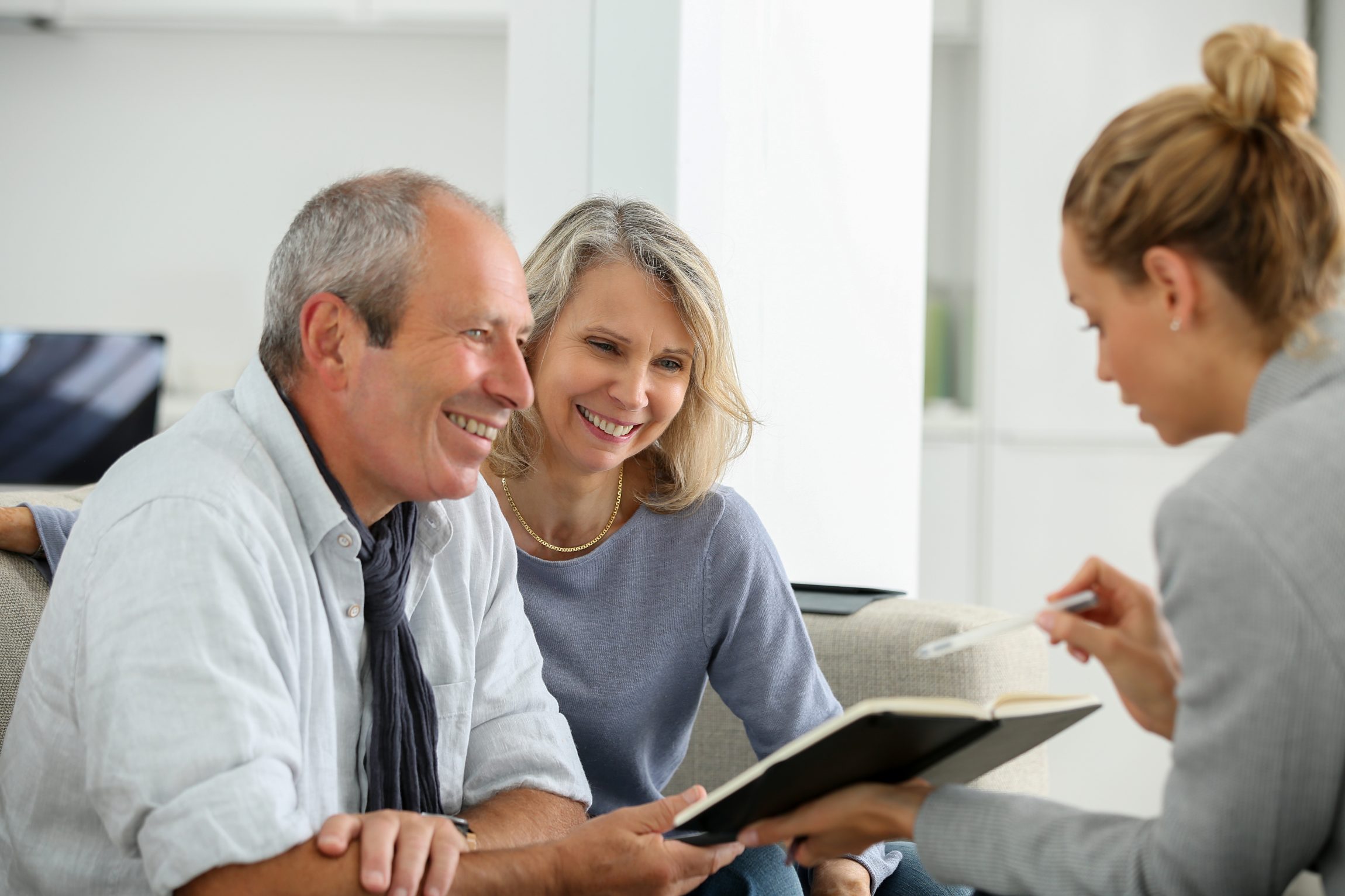 agent selling life insurance to retired couple